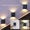 Lampada a sospensione decorativa da giardino intelligente per esterni di vendita calda Lampada da parete solare a LED luminosa su e giù impermeabile
