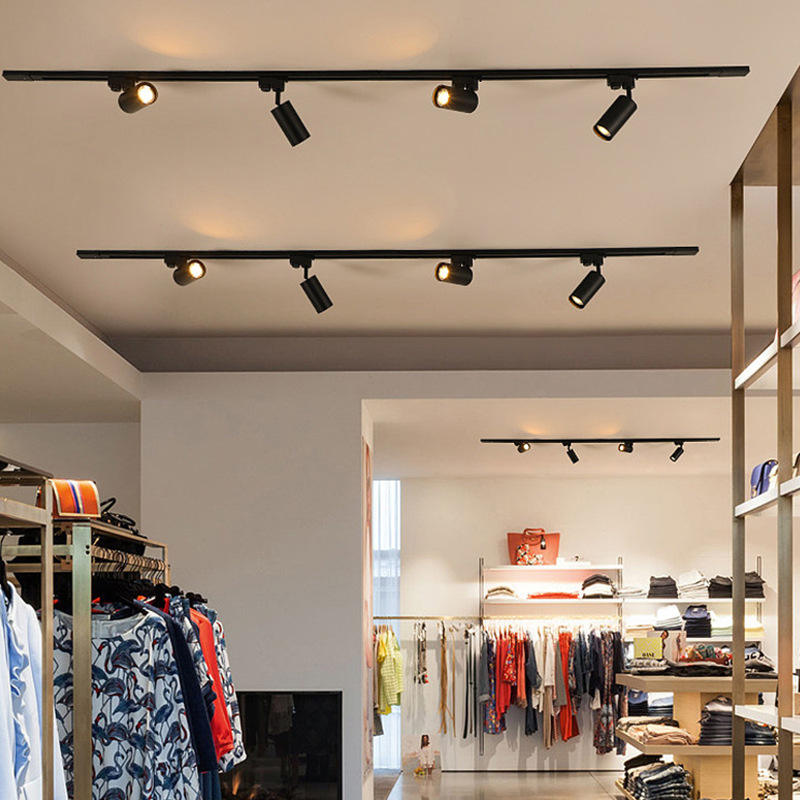 Faretto a binario ad alto display Faretto a LED Negozio di abbigliamento Montato a soffitto Sfondo del soggiorno Faretto a binario per rondelle da parete per guardaroba